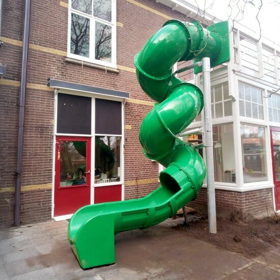 Maatwerk spiraalglijbaan groen Kids first kinderopvang